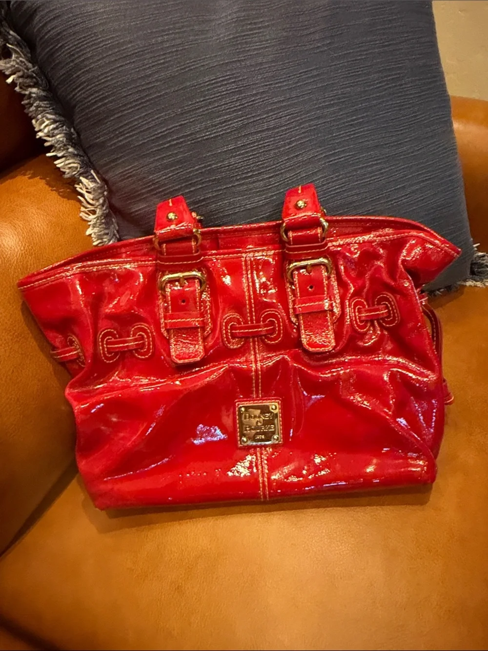 Dooney & Bourke Shiny Red Patent Leather Shoulder Bag with Buckle Straps